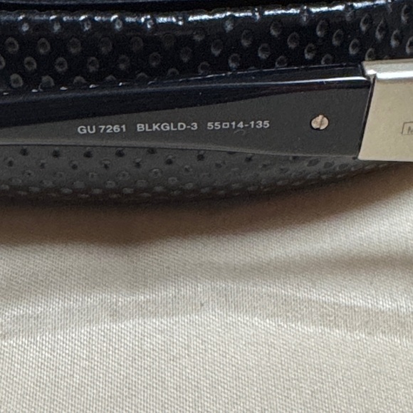 Guess Black and Silver Sunglasses with polarized lenses. - Picture 3 of 9